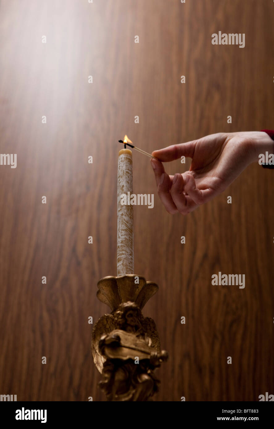 Hand holding candle holder hires stock photography and images Alamy
