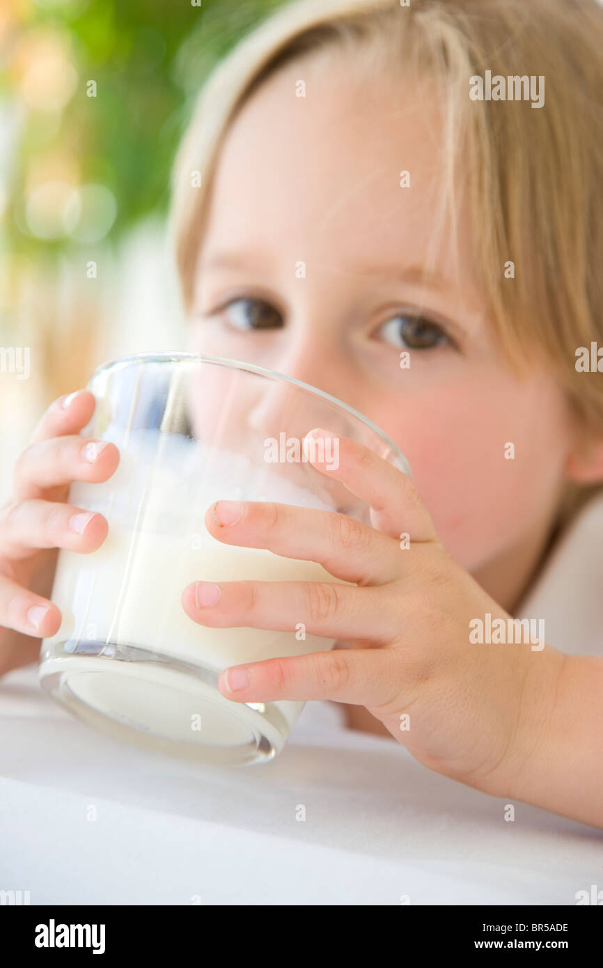 Young Boy Drinking Milk Stock Photo Alamy