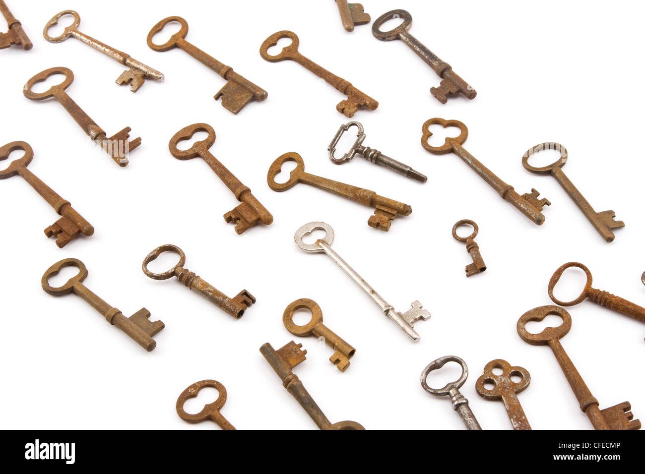 Old skeleton keys on white background Stock Photo Alamy