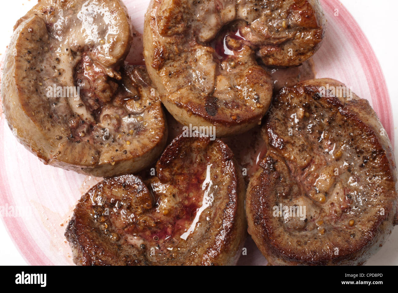 Pan fried lamb kidneys Stock Photo Alamy