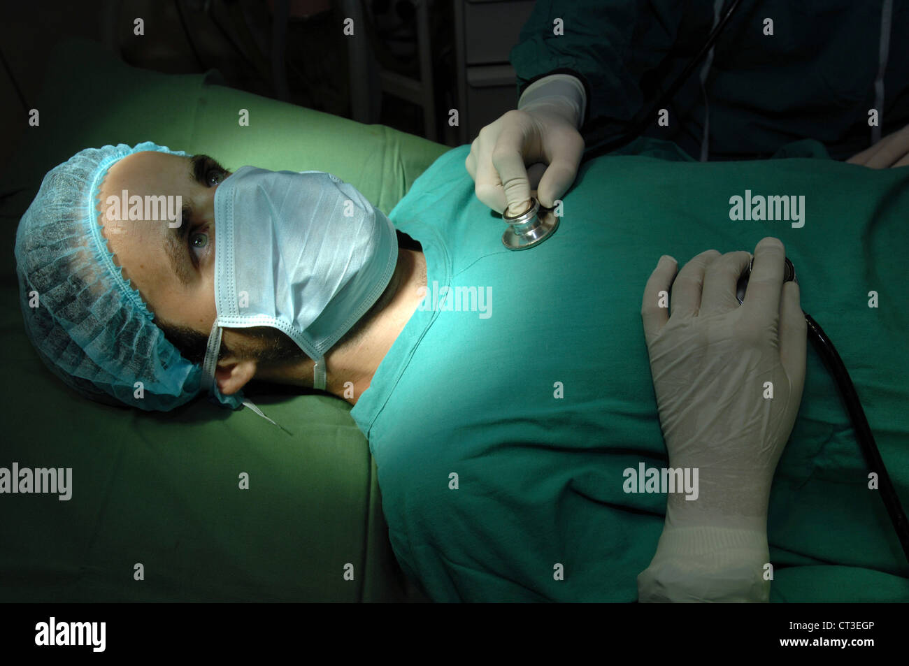 Checking breathing through chest Stock Photo Alamy