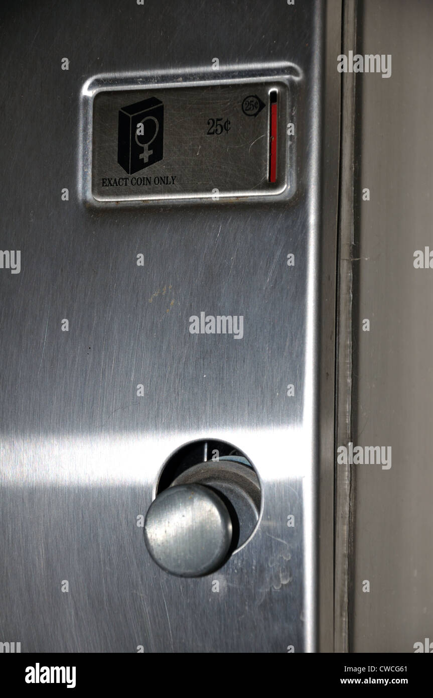 Condom dispenser at women's bathroom Stock Photo Alamy