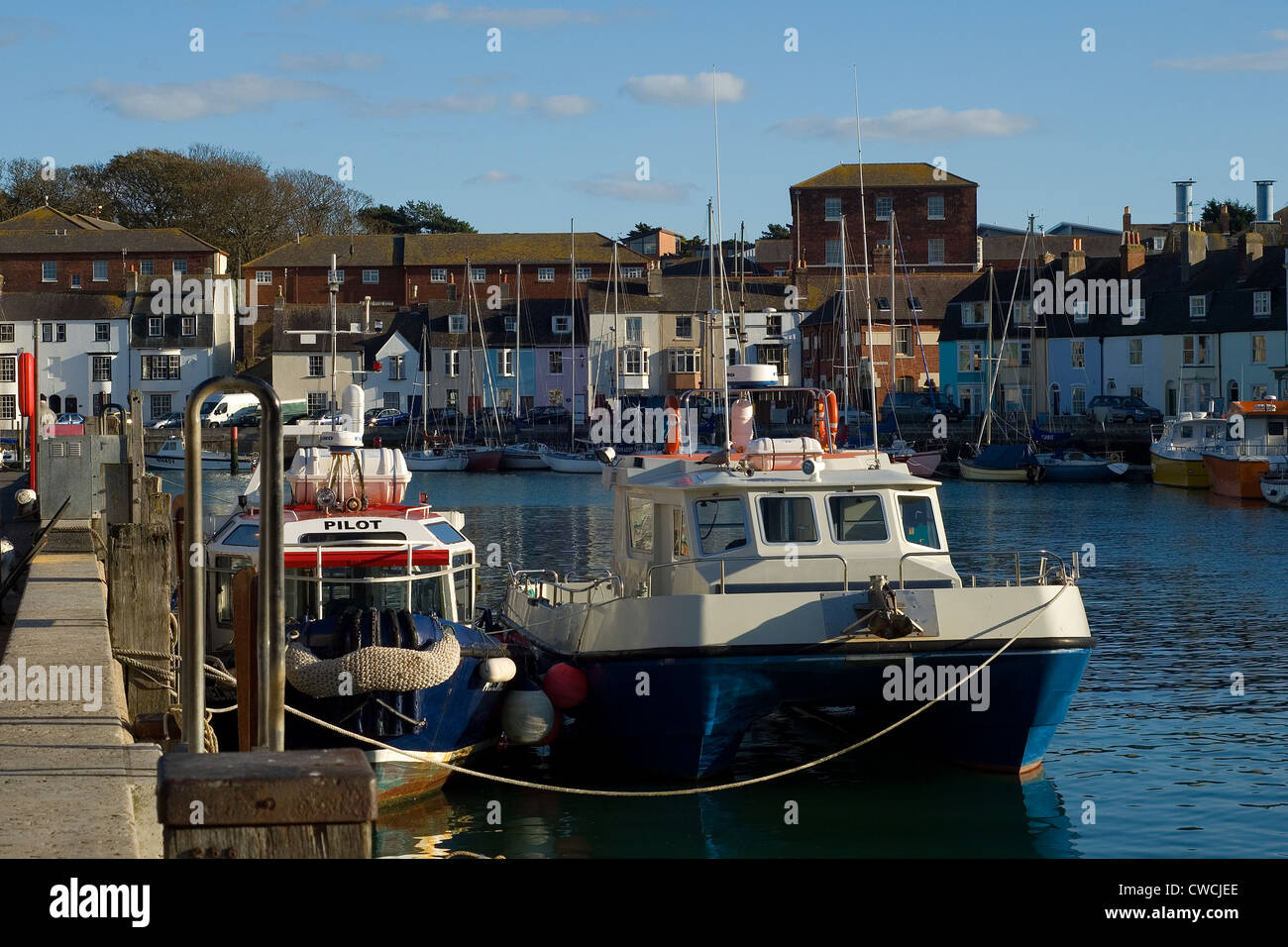 Weymouth Harbour with small boats Stock Photo Alamy