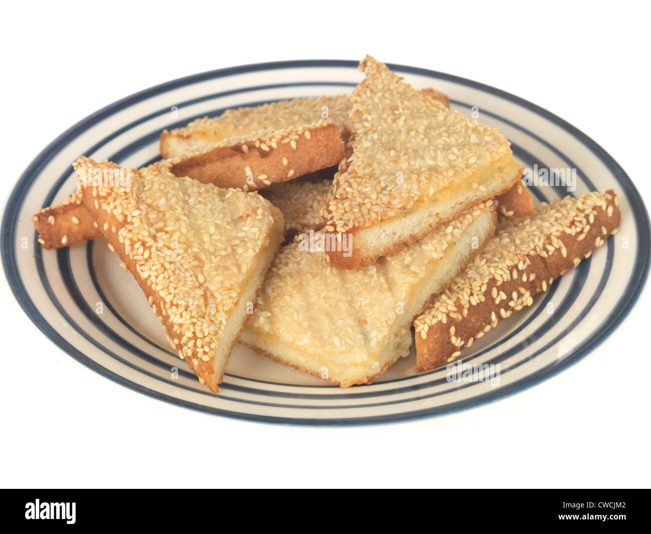 Fresh Chinese Style Fried Prawn Toast With Sesame Seeds Appetiser, Isolated Against A White