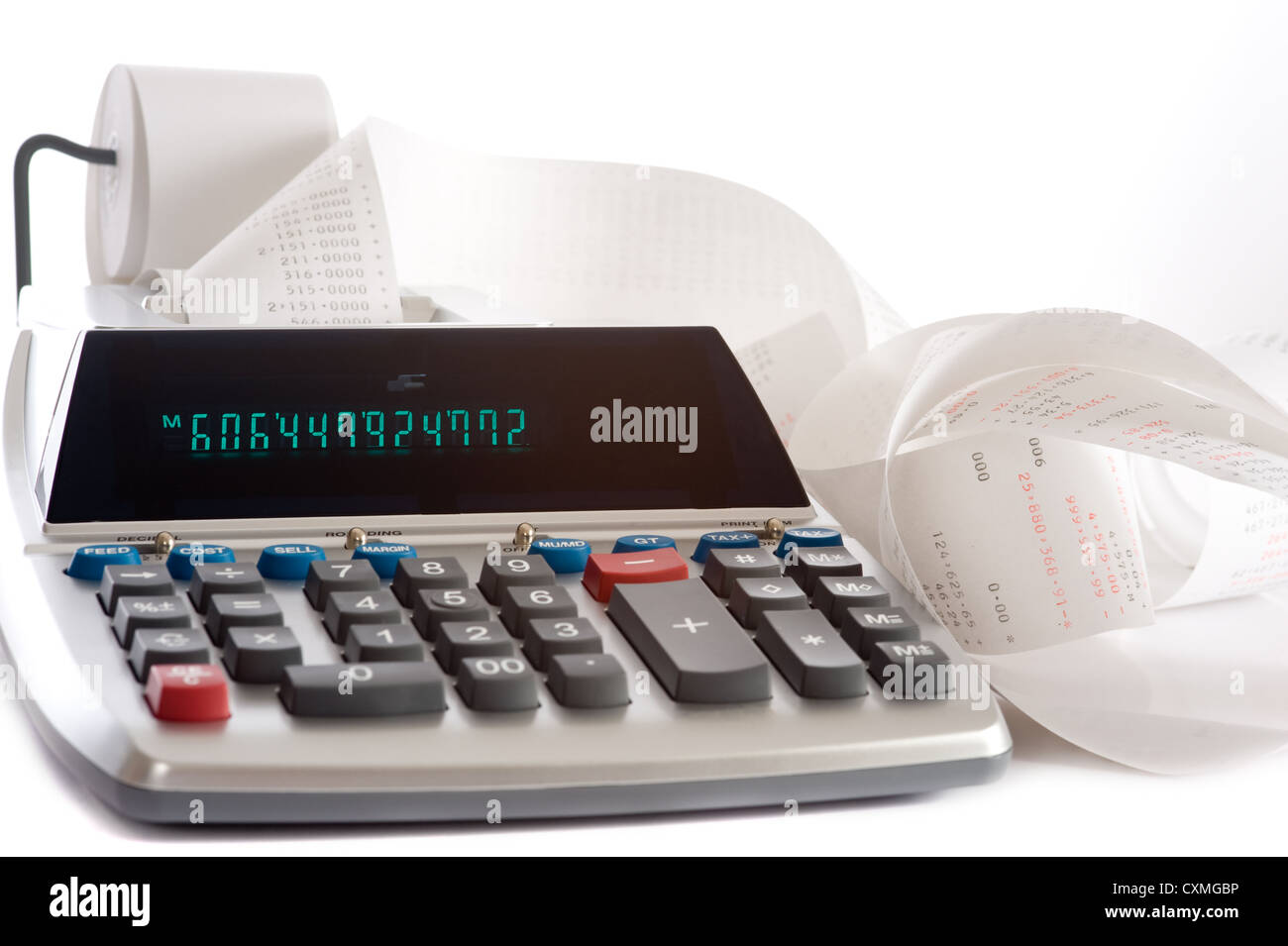 An adding machine or calculator with adding machine tape or paper Stock