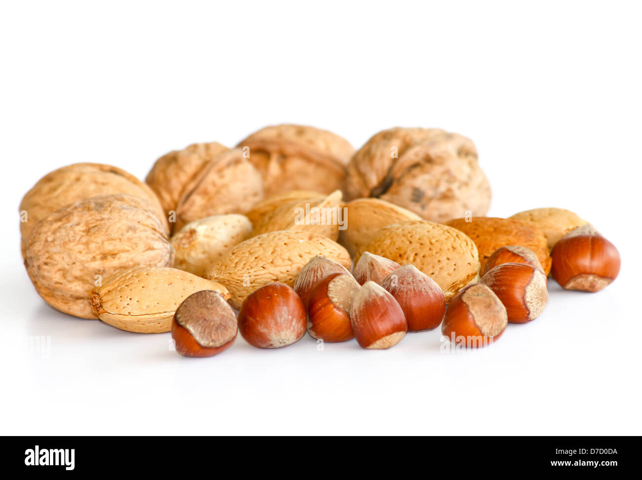 Nuts with shells isolated on white Stock Photo Alamy