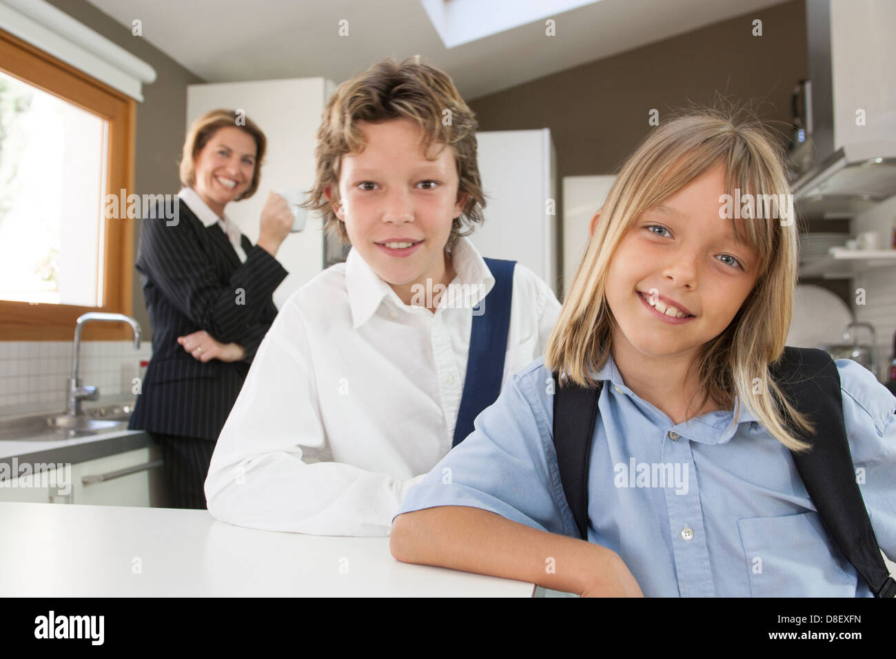 Children getting ready for school Stock Photo Alamy