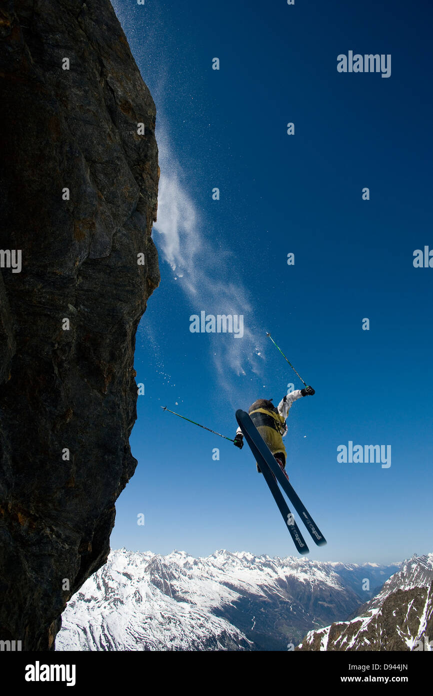 Man skiing off cliff hires stock photography and images Alamy