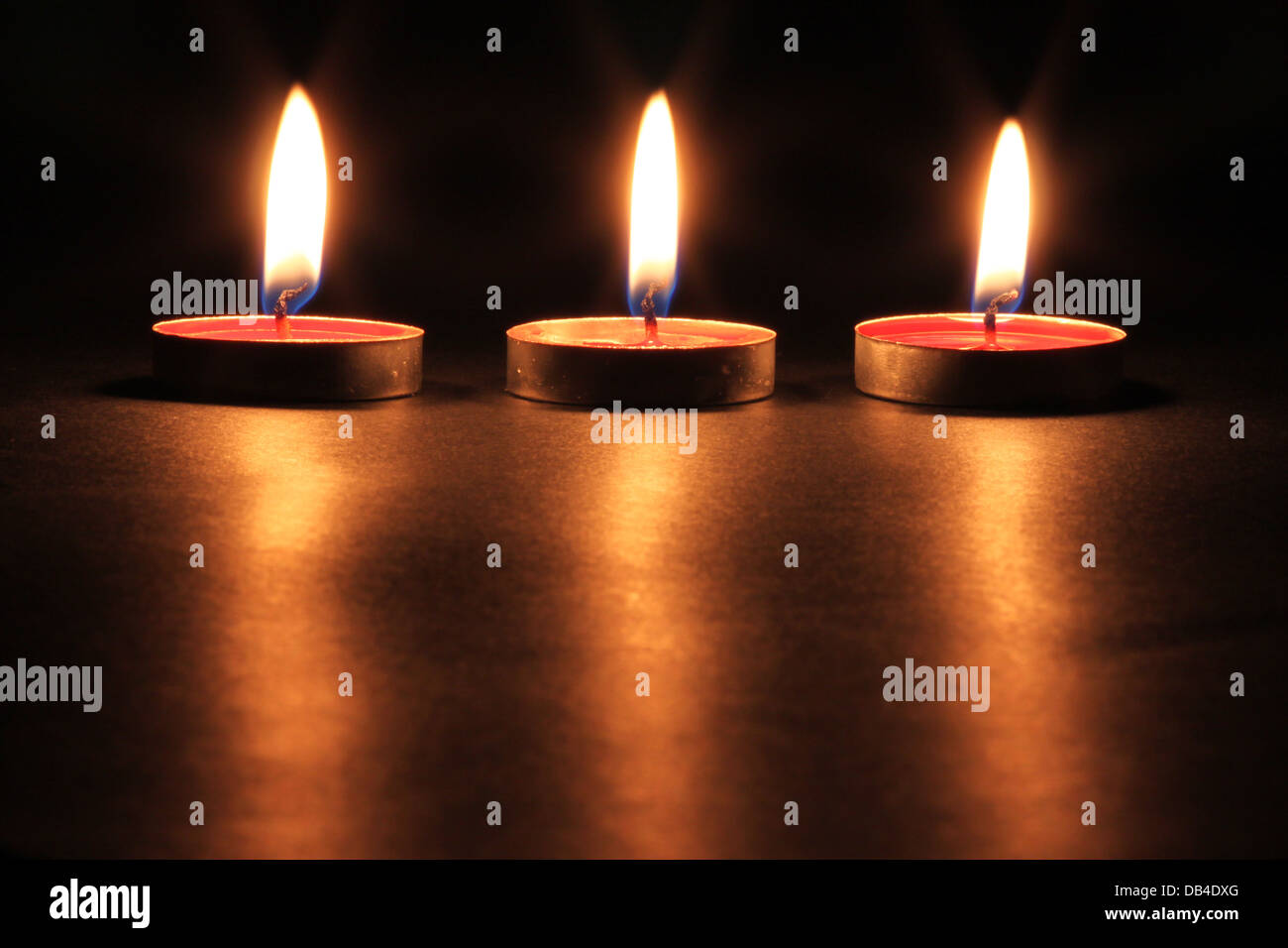 Three Burning Candle Stock Photo Alamy