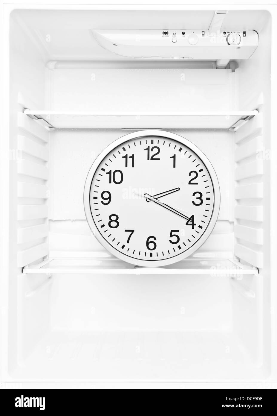Clock in a fridge Stock Photo Alamy