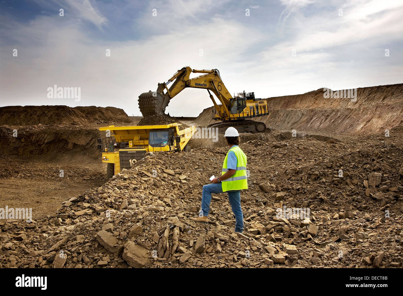 Supervisor overseeing gold mine operation in open cast