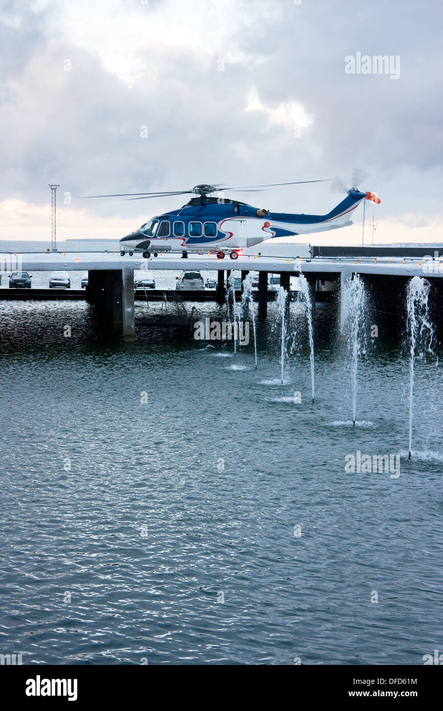 Blue and white helicopter hires stock photography and images Alamy