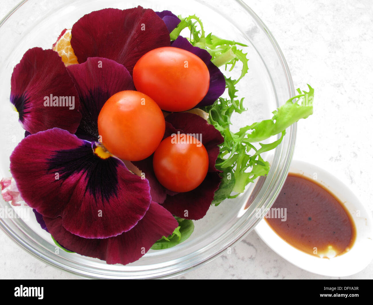 Salad with edible flowers Stock Photo Alamy