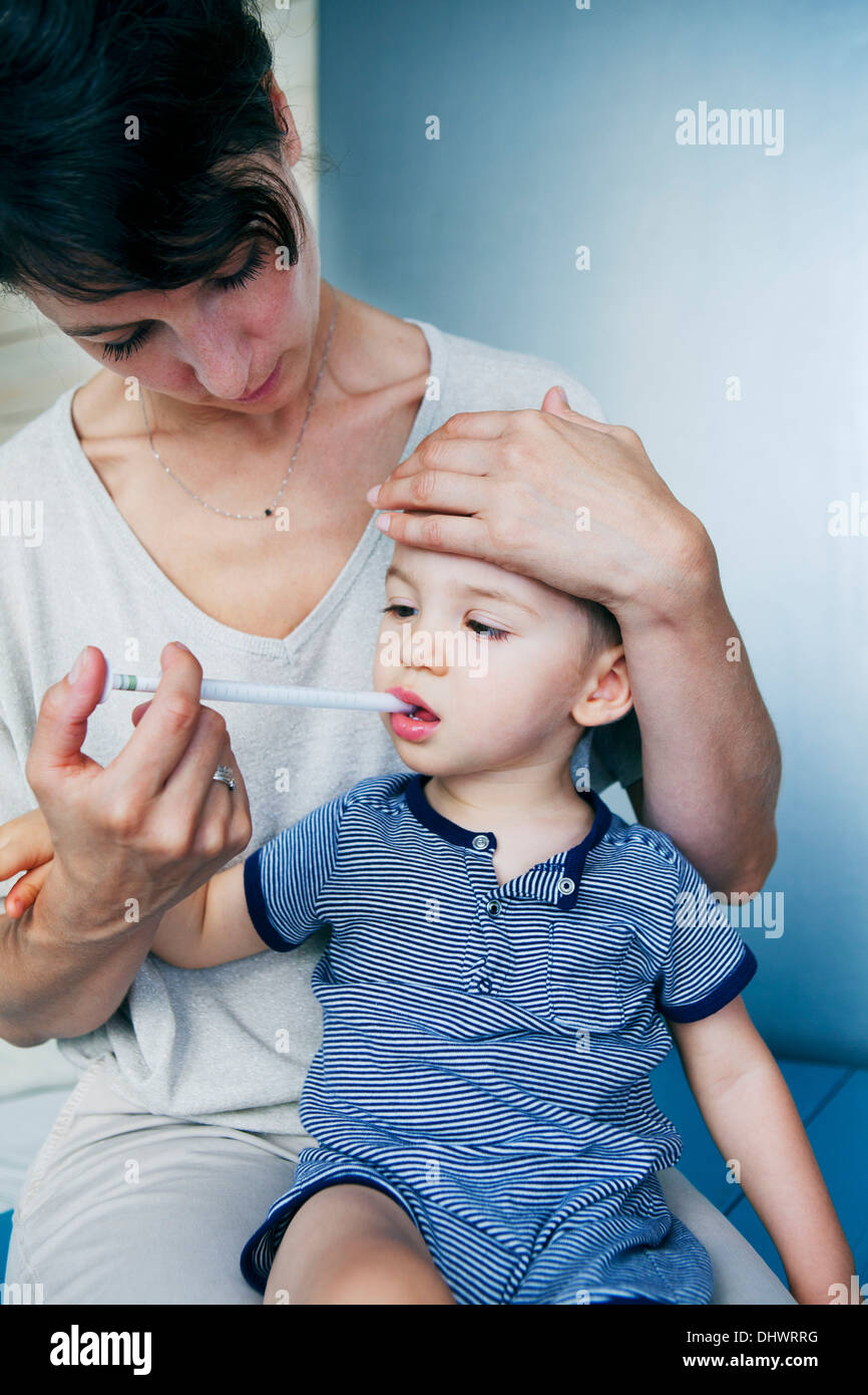 CHILD TAKING MEDICATION Stock Photo Alamy
