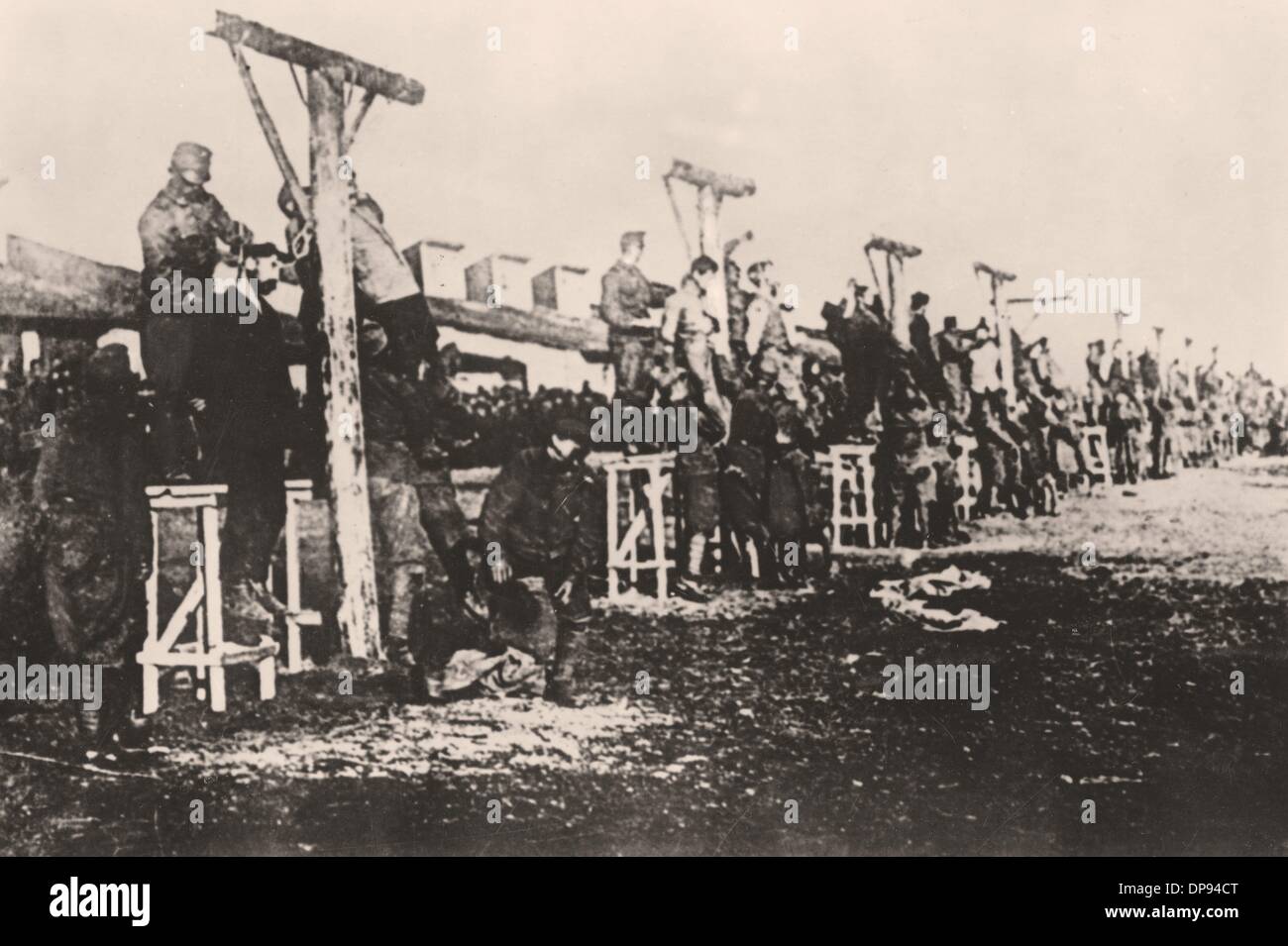 Execution of Russian workers (?) by AustroHungarian soldiers using