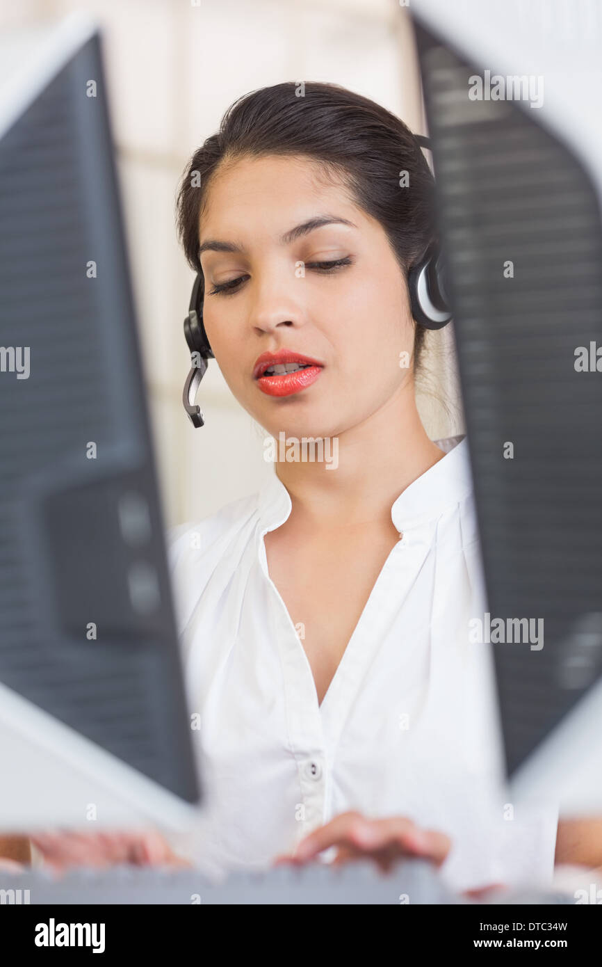Customer service representative using computer Stock Photo Alamy