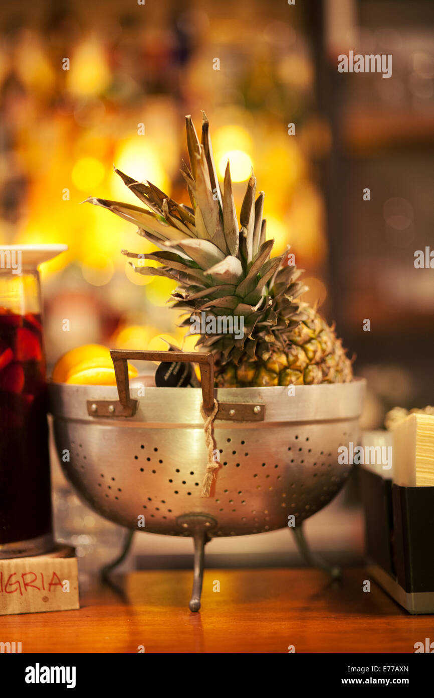Pineapple inside a colander Stock Photo Alamy