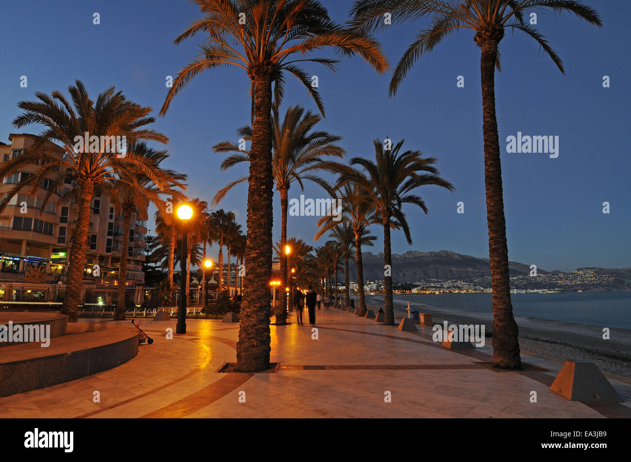 Beach promenade, dusk, Albir, Spain Stock Photo Alamy