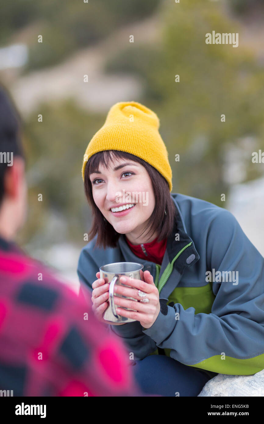 Couple drinking coffee outdoors Stock Photo Alamy