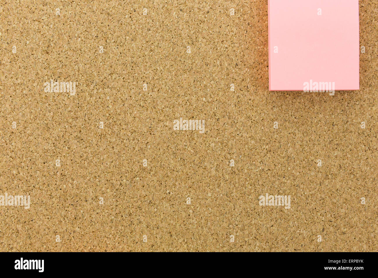 pink note on cork board Stock Photo Alamy