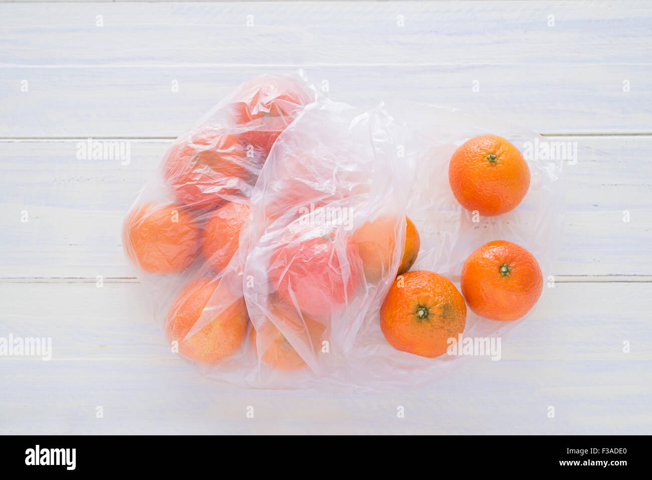 mandarin oranges in a plastic bag Stock Photo Alamy