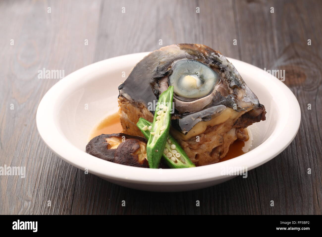 fried fish head Stock Photo Alamy