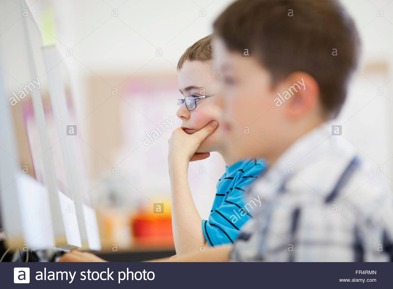 elementary students learning on computers Stock Photo Alamy