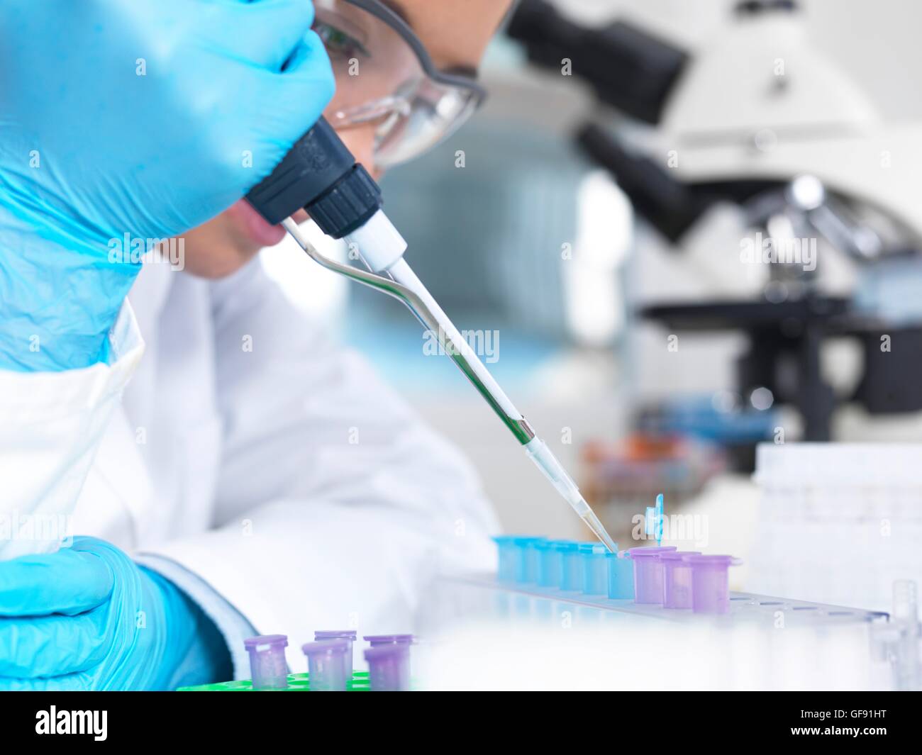 PROPERTY RELEASED. MODEL RELEASED. Preparing sample vials. Laboratory