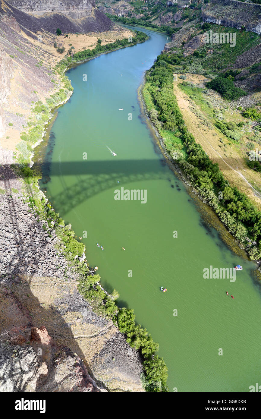 Shadowed bridge over snake river Stock Photo Alamy