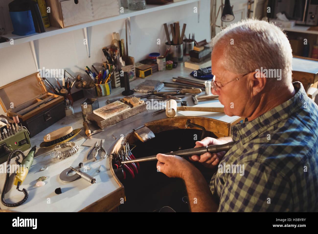 Goldsmith preparing work tool Stock Photo Alamy