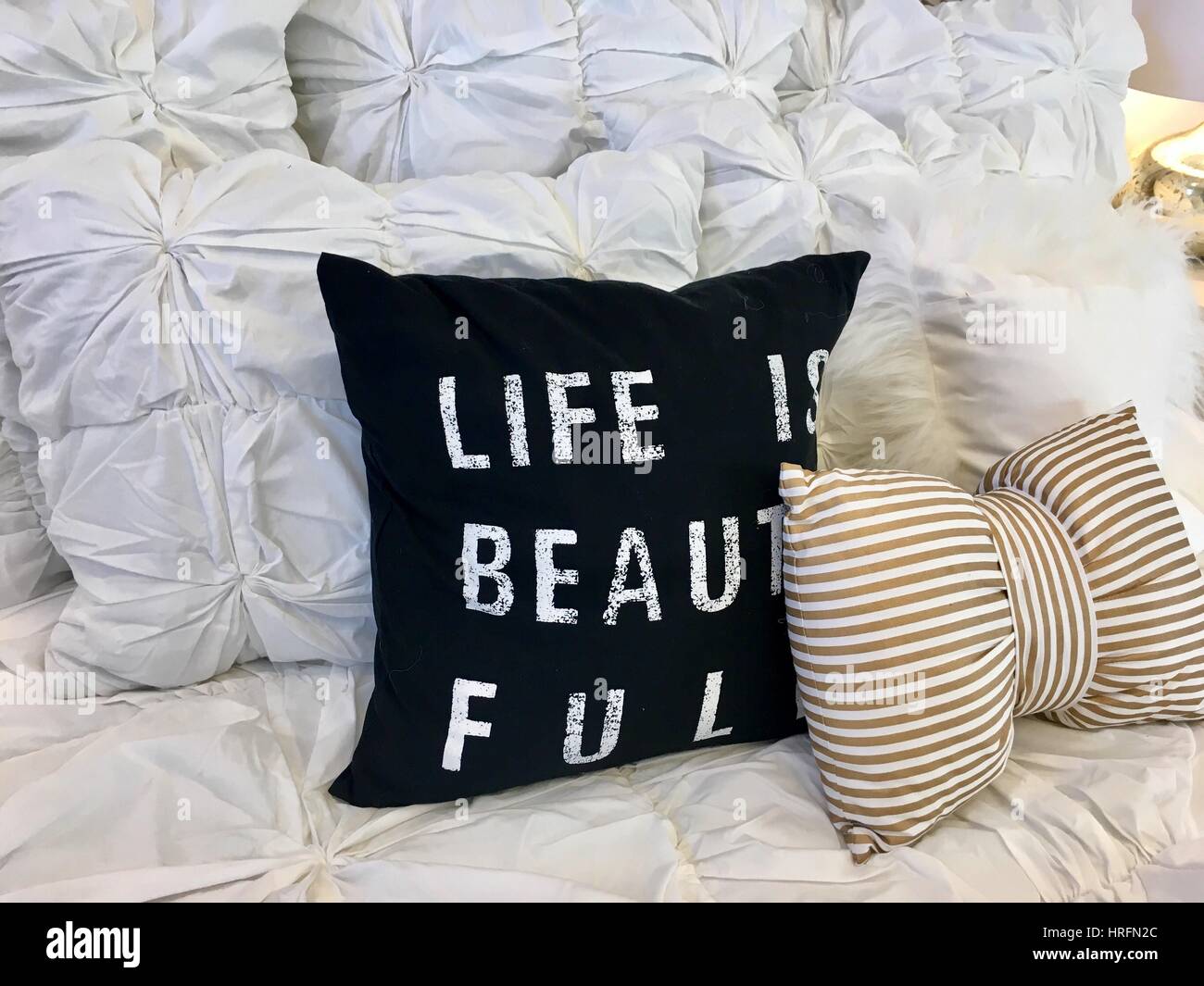 Throw pillows on a bed Stock Photo Alamy