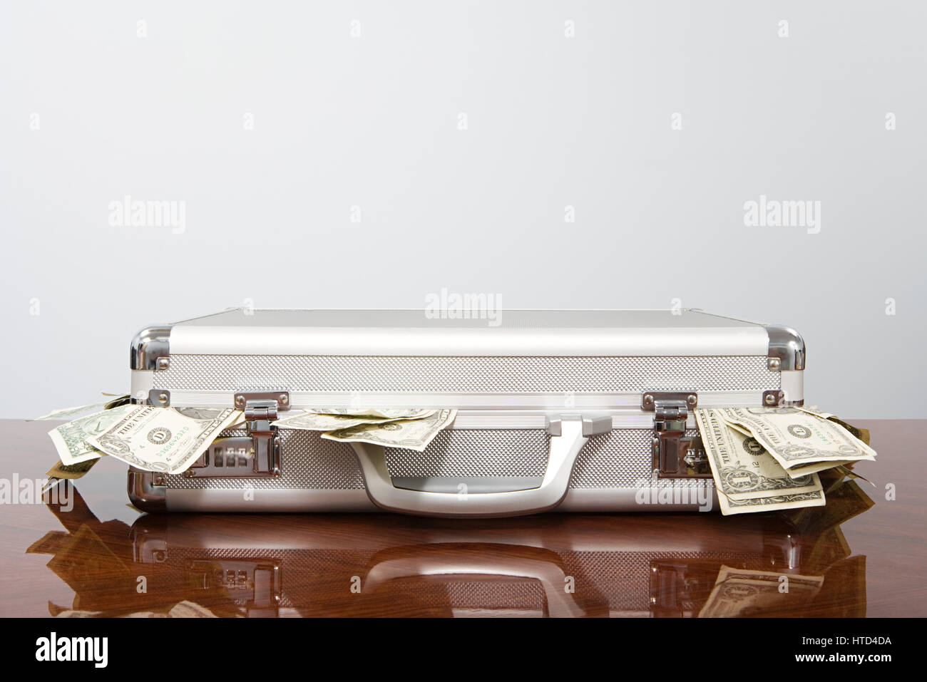 Money in a briefcase Stock Photo Alamy