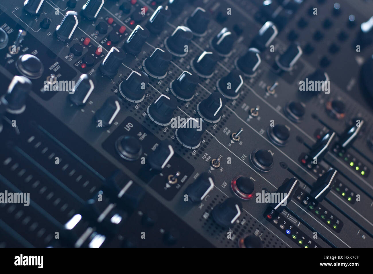 DJ audio mixer knobs in side light Stock Photo Alamy