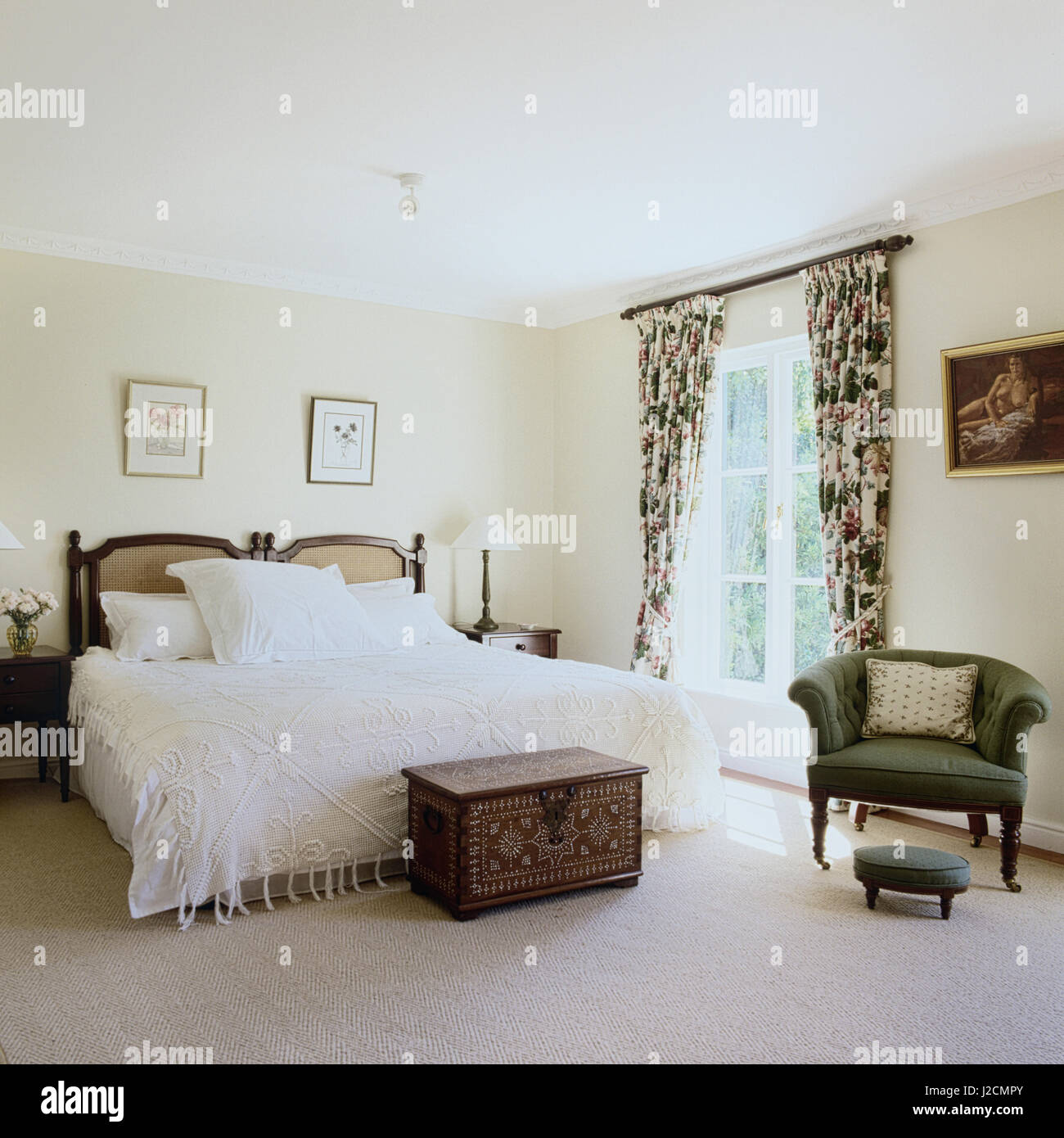 Bedroom with white bedding Stock Photo Alamy