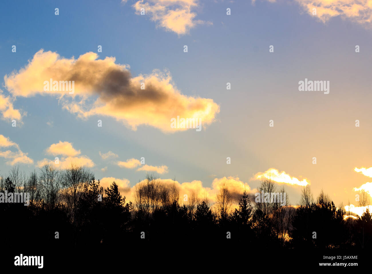 Sunset with gold clouds Stock Photo Alamy