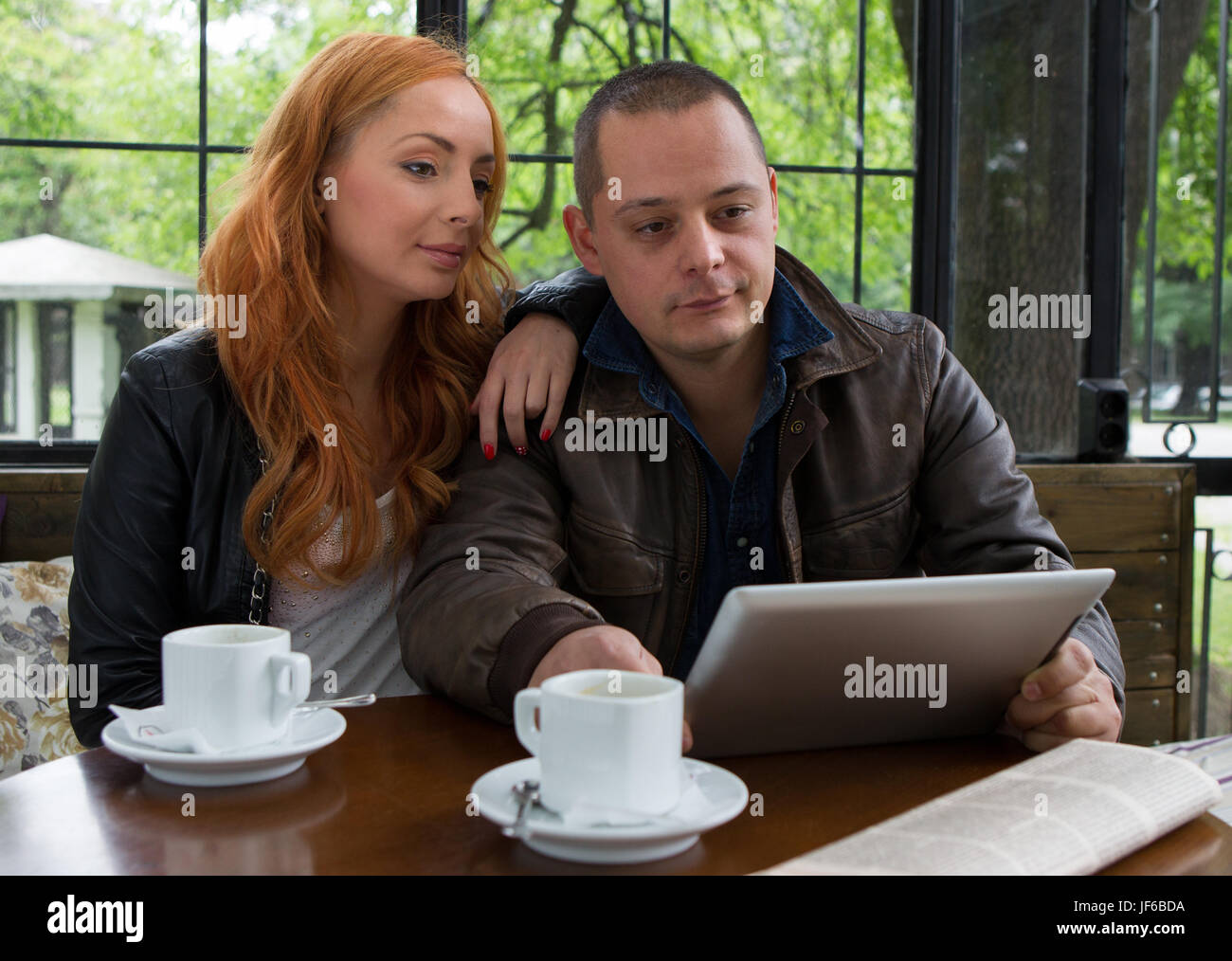 Two students drinking coffee Stock Photo Alamy