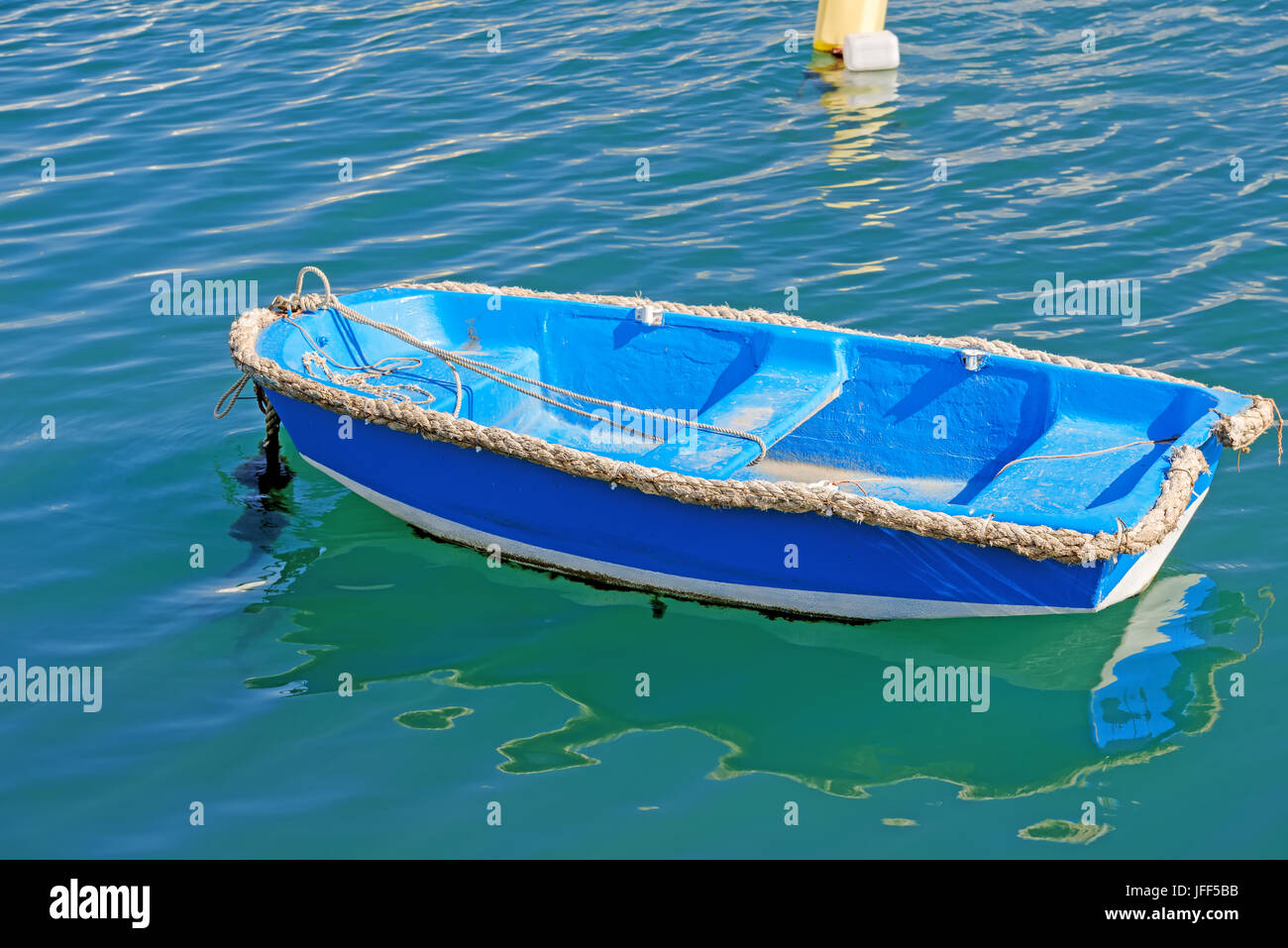 Tiny Blue dingy Stock Photo Alamy