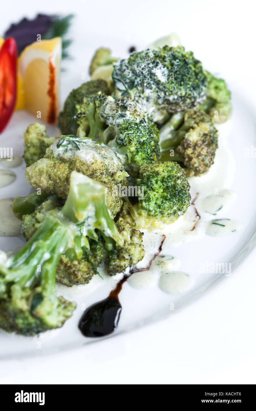 Steamed fish with broccoli Stock Photo Alamy