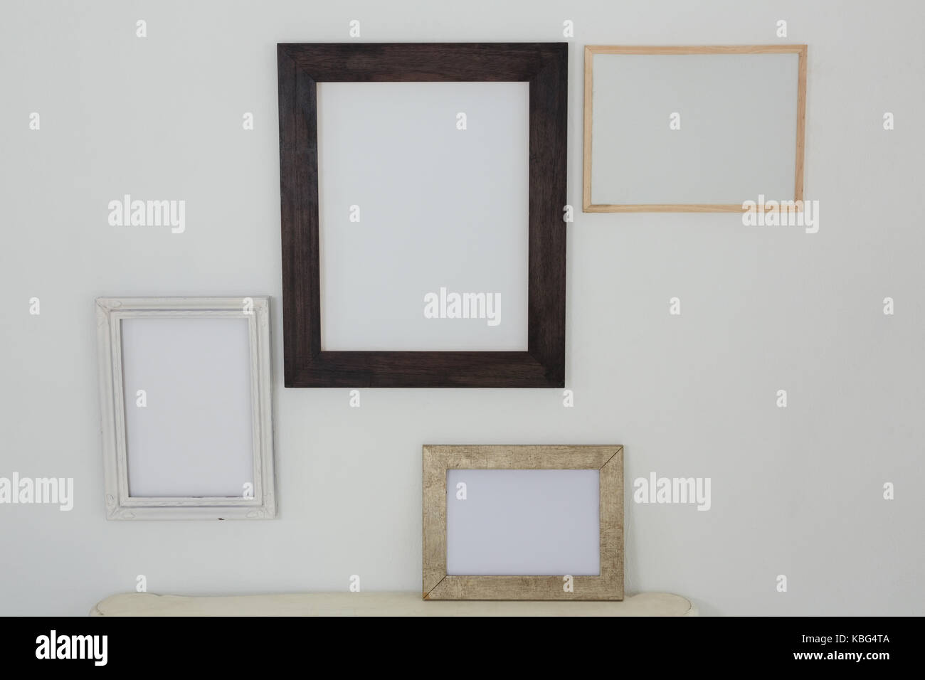 Various frames hanging on wall Stock Photo Alamy