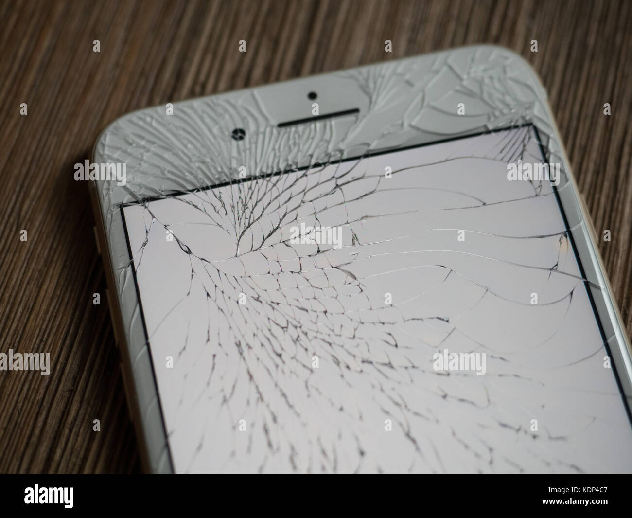 A shattered iPhone 7 Plus screen Stock Photo - Alamy