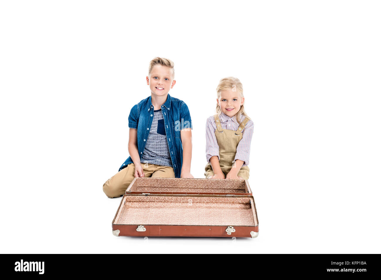 children with empty suitcase Stock Photo Alamy