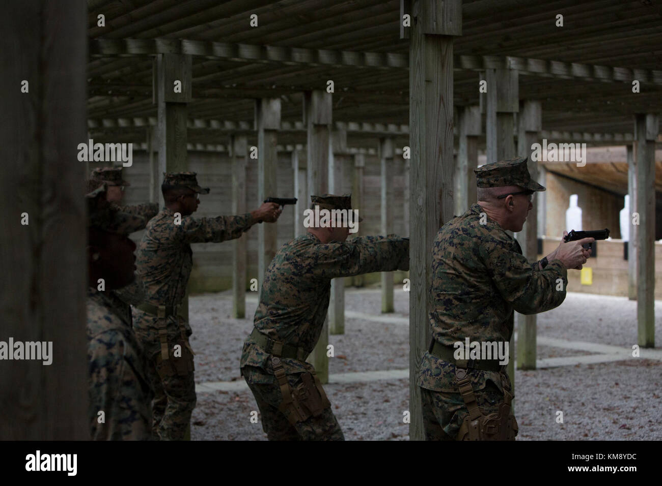 u.s. marines with deployment processing command reserve support unit east, bring their weapons