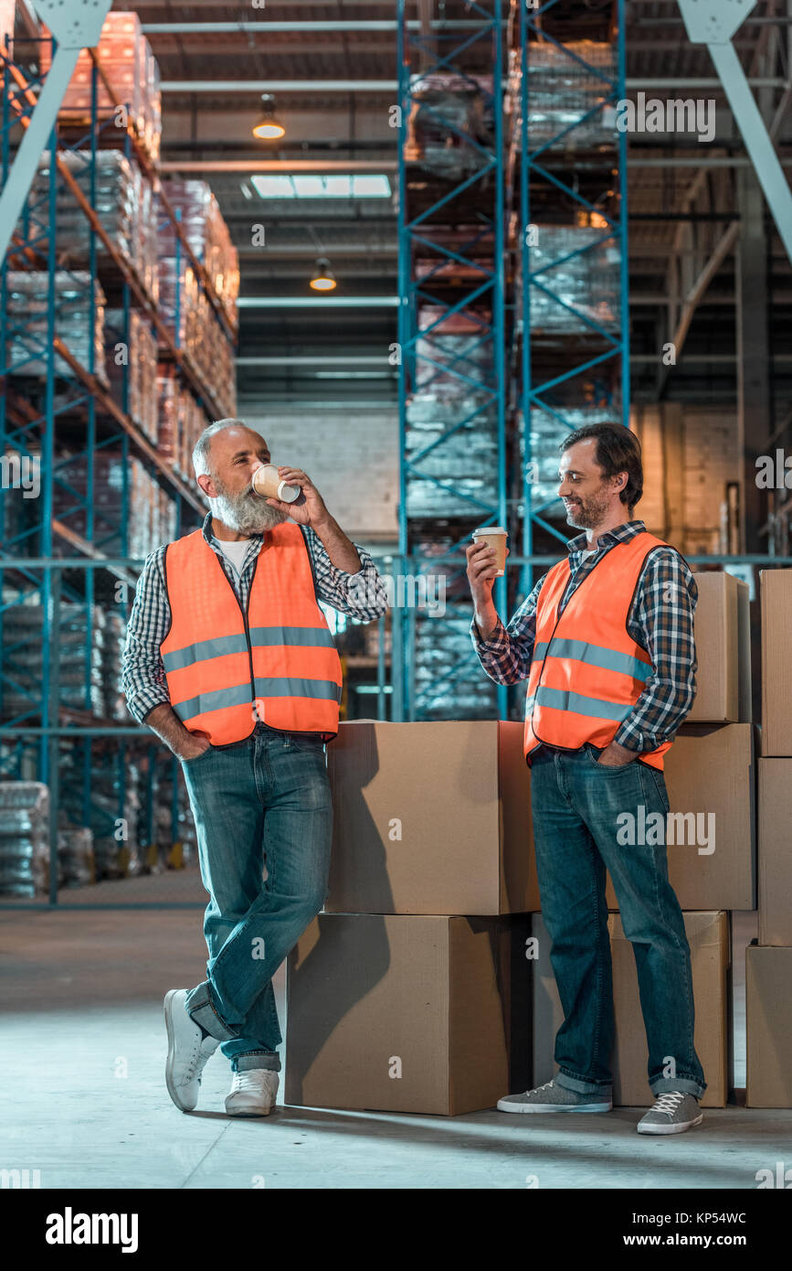 warehouse workers drinking coffee Stock Photo Alamy
