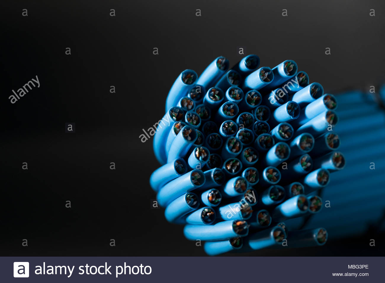 Blue computer cable bundle Stock Photo Alamy