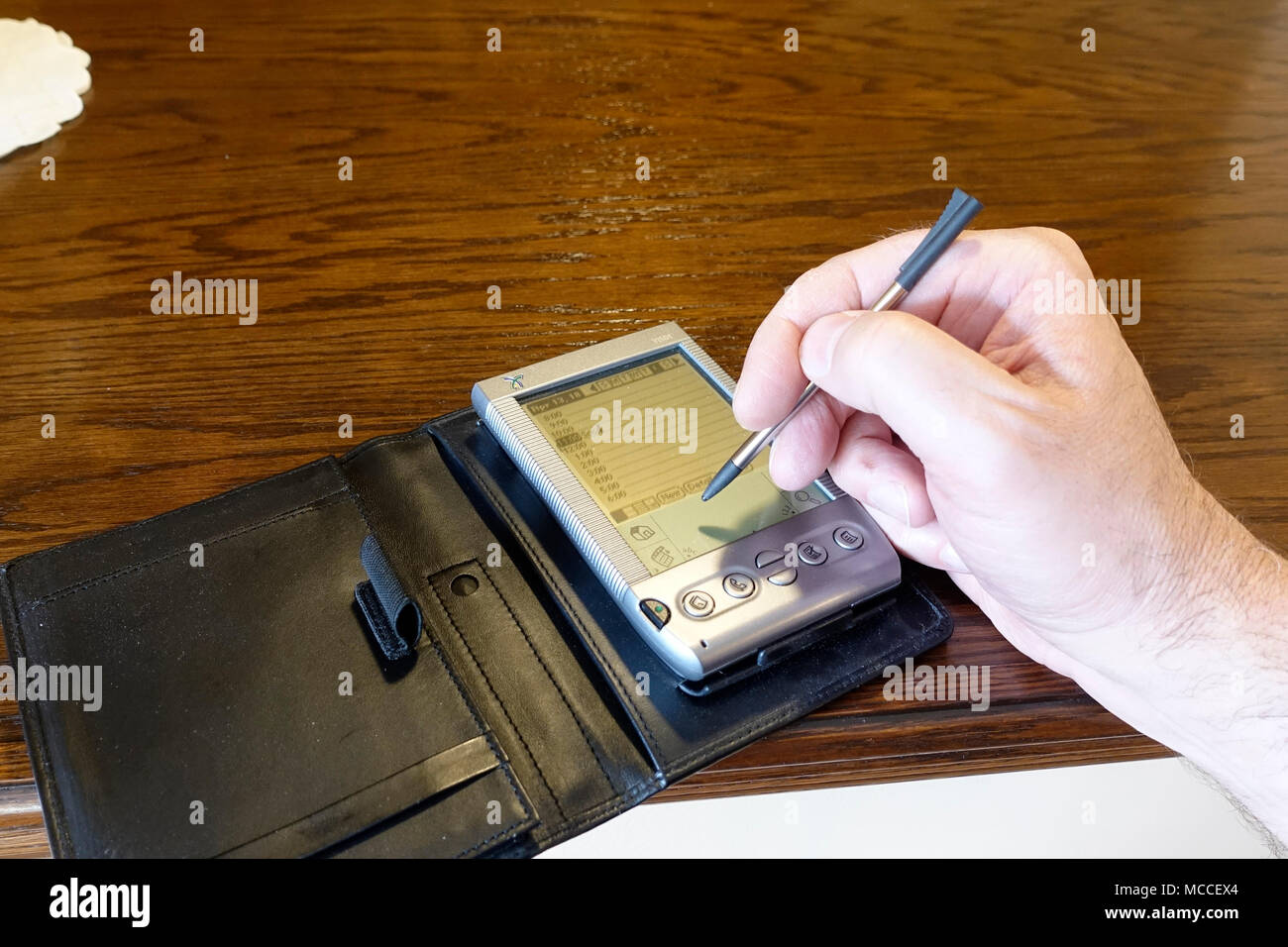Using a PDA (Handspring Visor Stock Photo Alamy