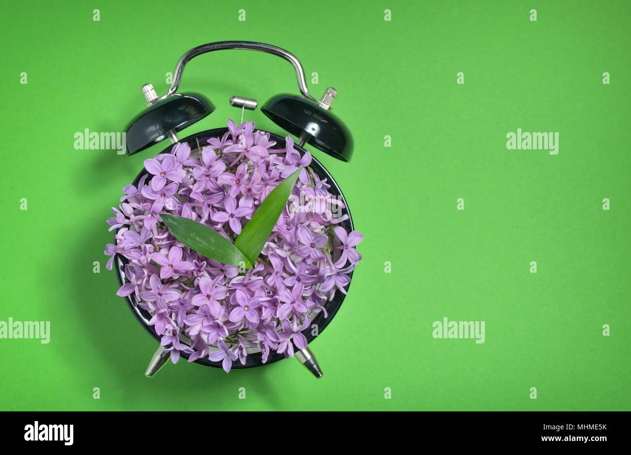Spring time retro clock concept Stock Photo Alamy