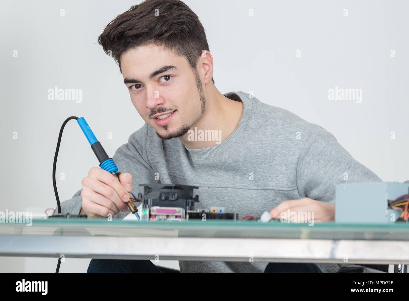 using soldering iron Stock Photo Alamy