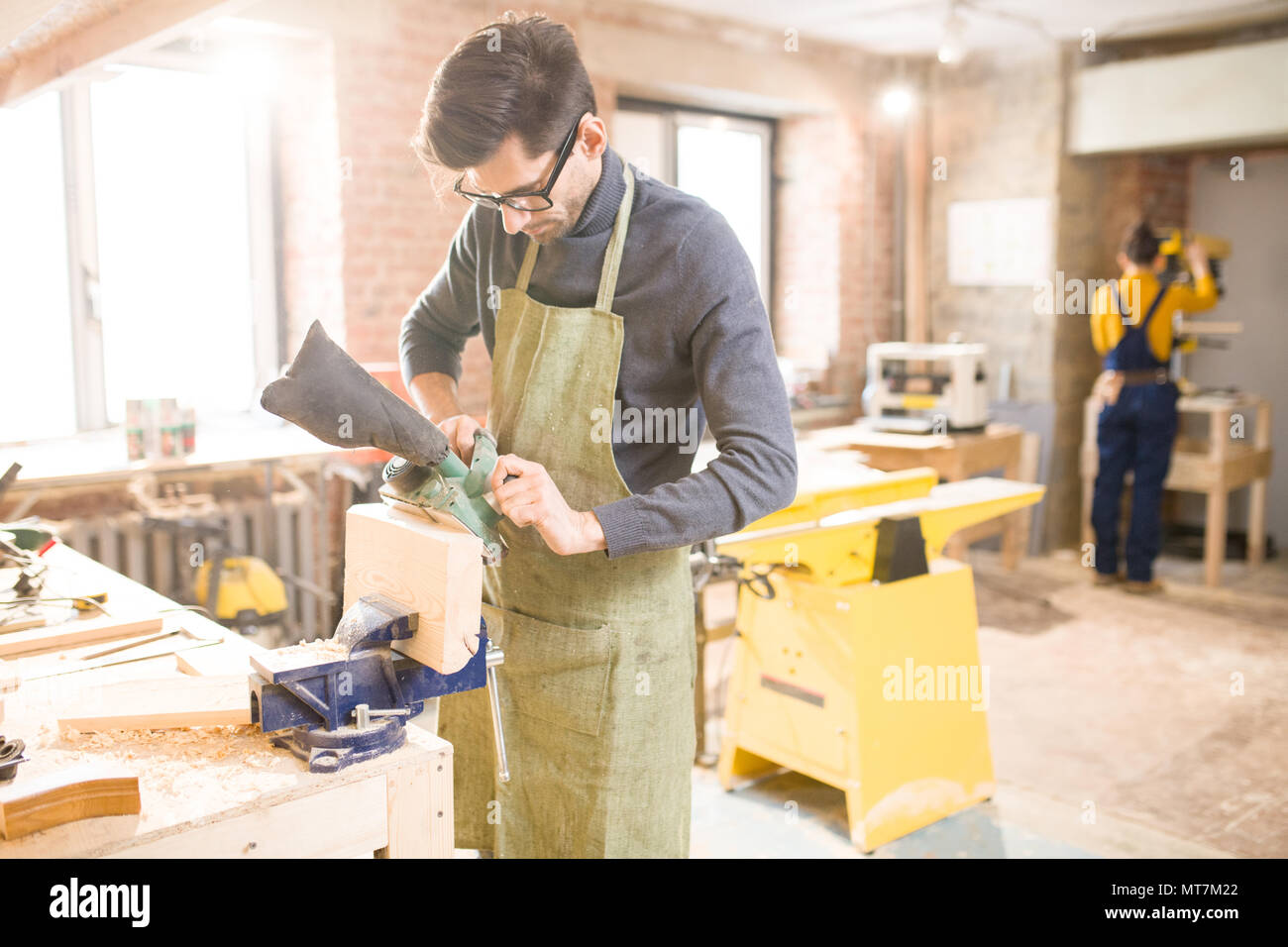 Modern Carpenter in Sunlit Stock Photo Alamy