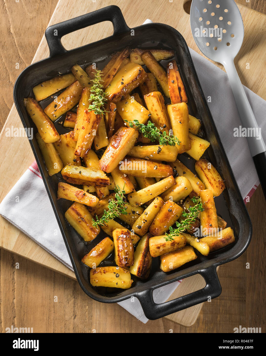 Honey roast parsnips Stock Photo Alamy