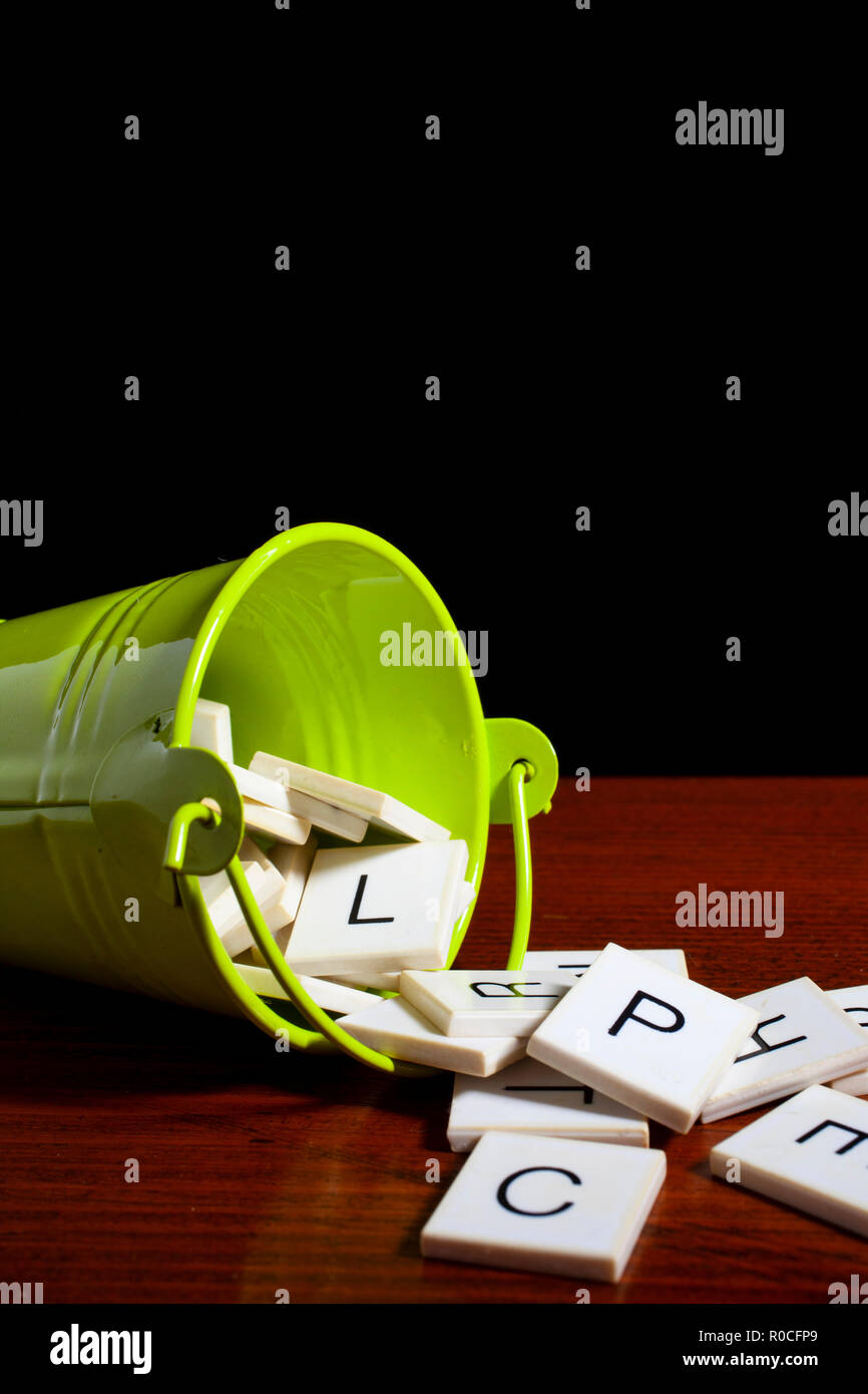 letter blocks in a bucket Stock Photo Alamy